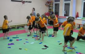 Scenario of sports activities with children and parents of the senior group